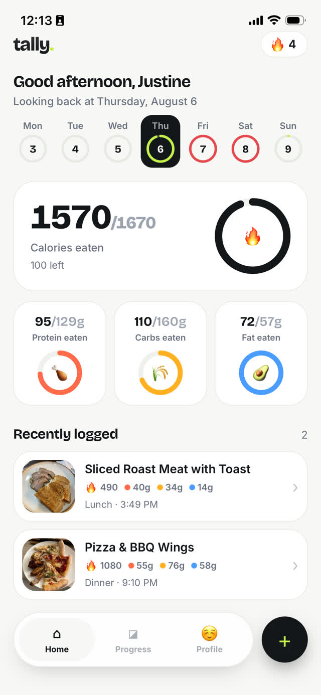 Tally home screen showing calories eaten against a daily target, macro rings for protein, carbs and fat, and two logged meals with photos.